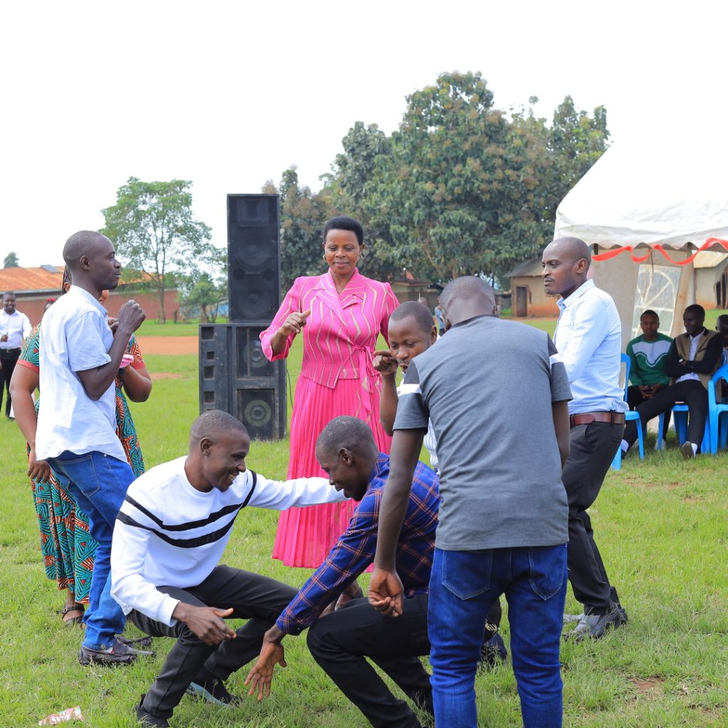 Men and women dancing in a group
